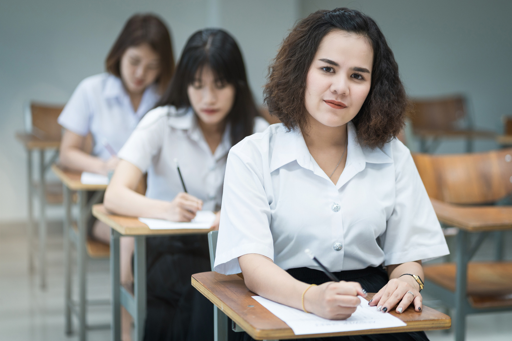 Teen College Students Taking an Exam